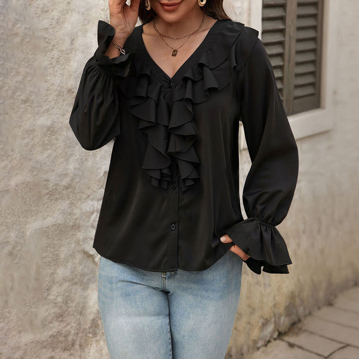 Kvinders bluse med elegante flæsedetaljer og chic V-hals Stilla