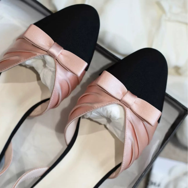 Dame Slingback-pumps med elegant satindetalje og struktureret sål Stilla