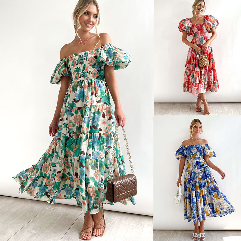Dame Maxikjole med voluminøse puffærmer og florale detaljer Stilla