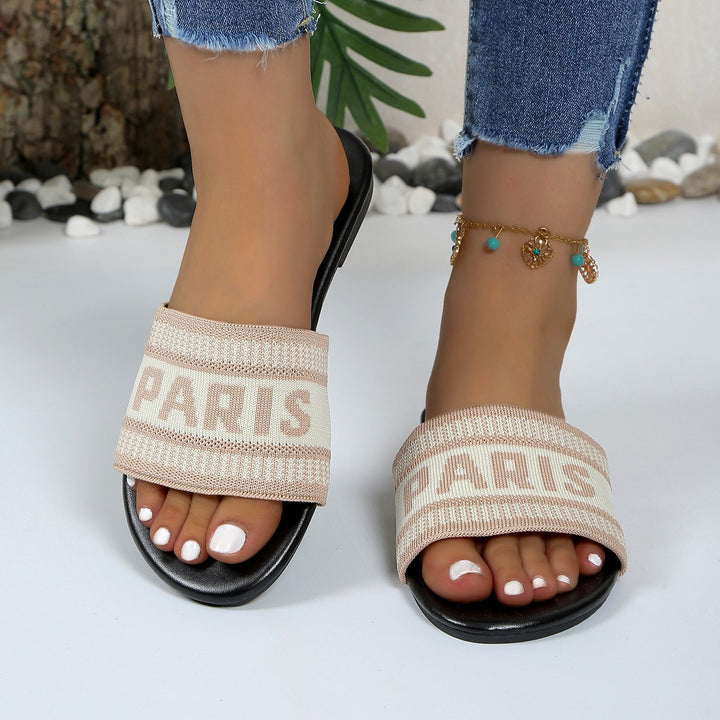 Dame modeslidesandaler med trendy skriftzug Stilla