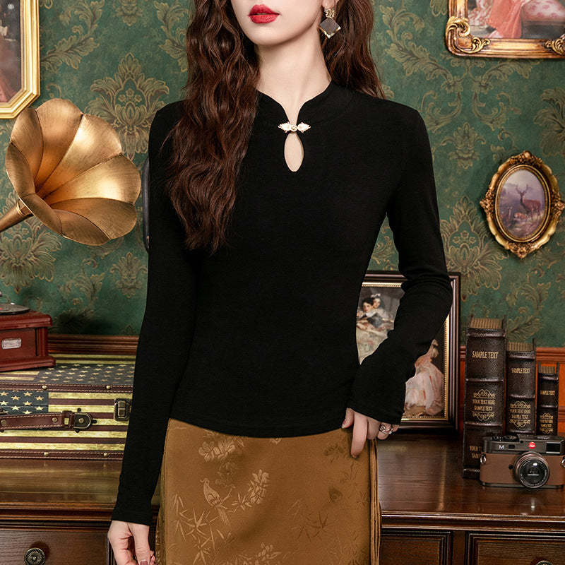 Dame langærmet top med elegant nøgleudskæring og pyntknap Stilla