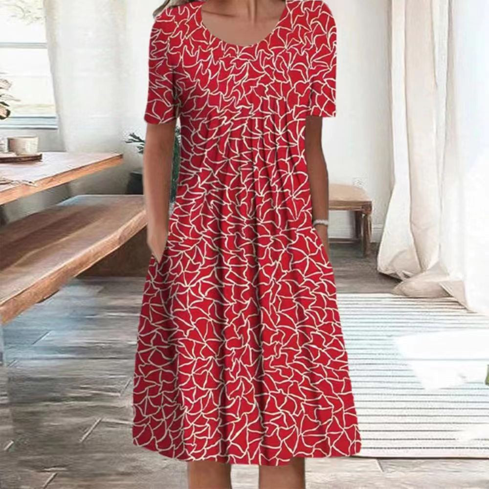 Dame fritidskjole med blomstret design og praktiske lommer Stiila