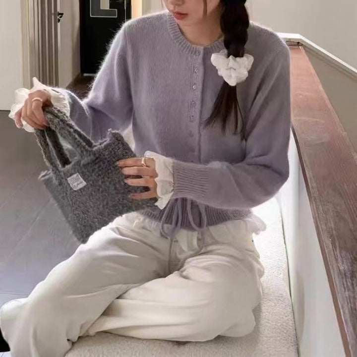 Kvinders cardigan med flæser og taljebånd Stilla