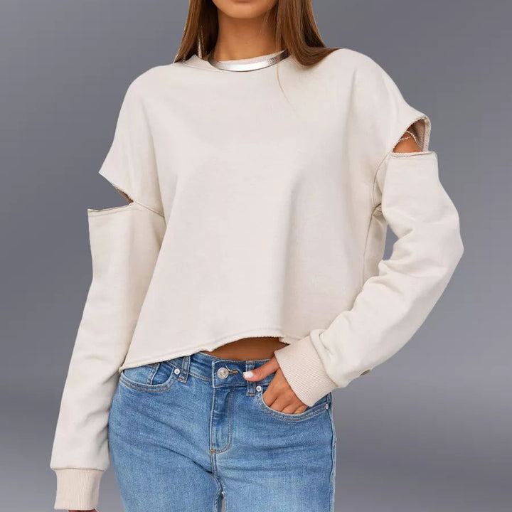 Dame afslappet sweatshirt med asymmetrisk cut-out-detaljer og oversized snit Stilla