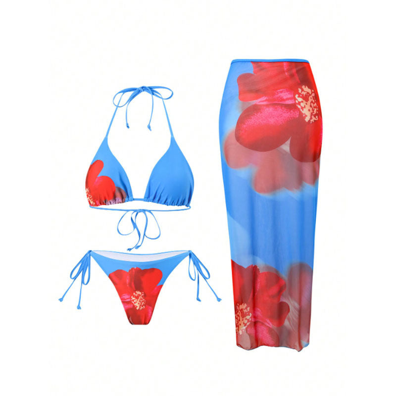 Dame strandkjole med blomsterprint og sidelange bindebånd Skovae