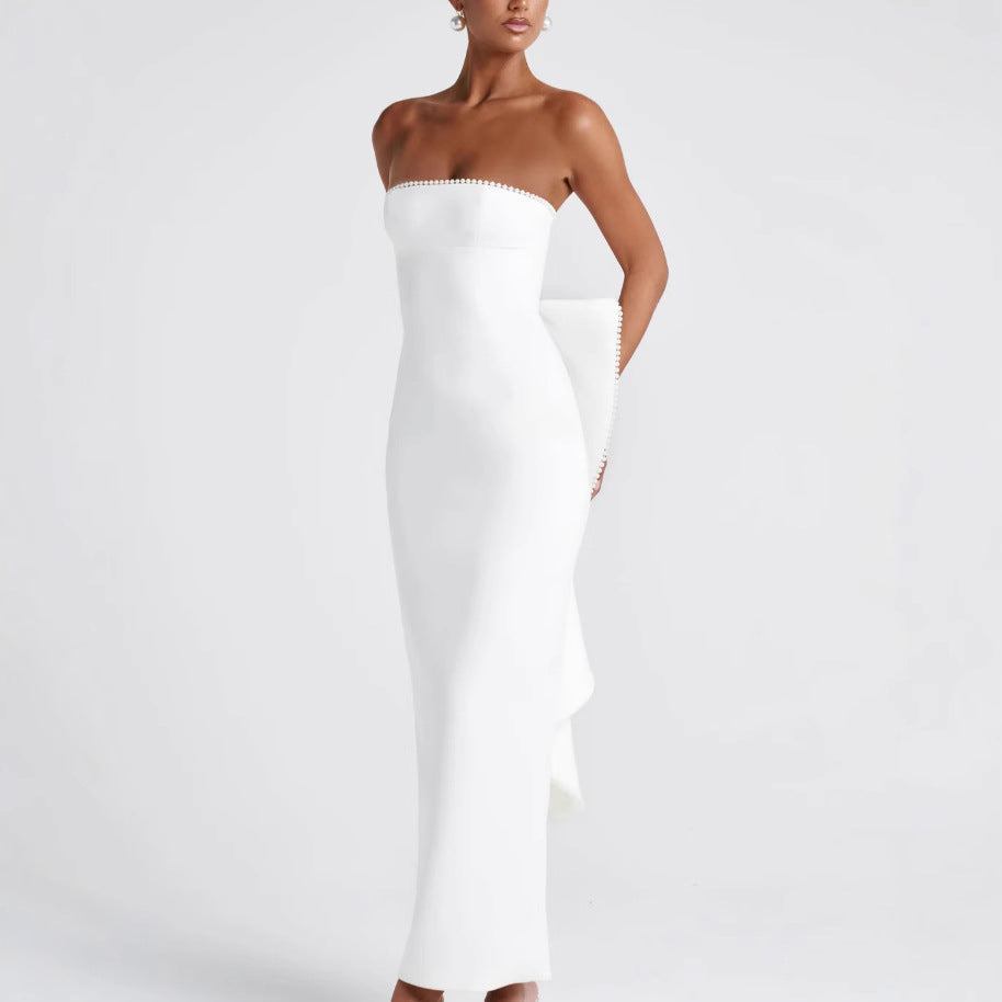 Kvinders elegante figursyede maxikjole med off-the-shoulder design og trendy ruffle detaljer