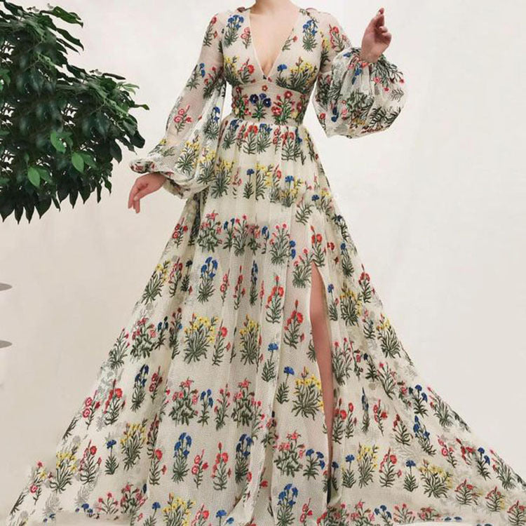 Dame maxikjole med blomsterprint og svajende ærmer Stilla