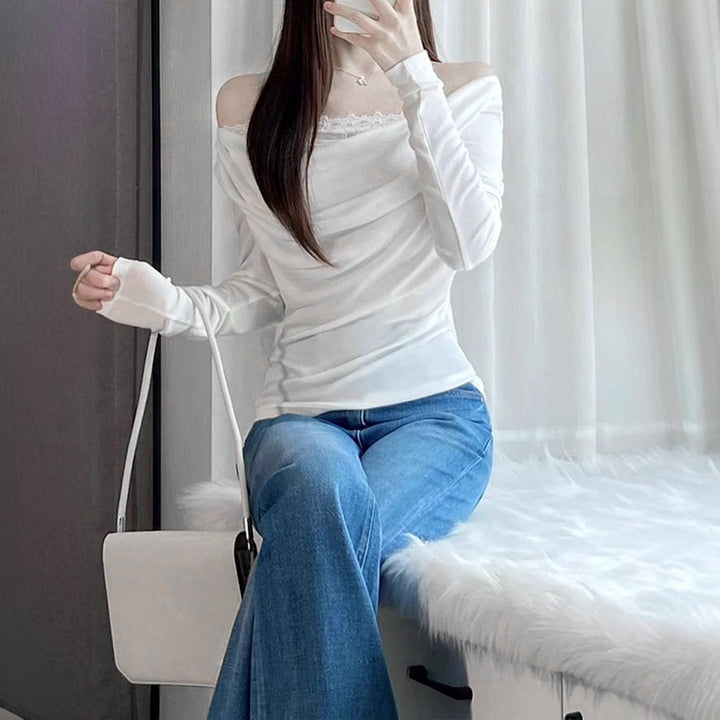 Dame Langærmet bluse med asymmetrisk udskæring og elegant drapering Skovae