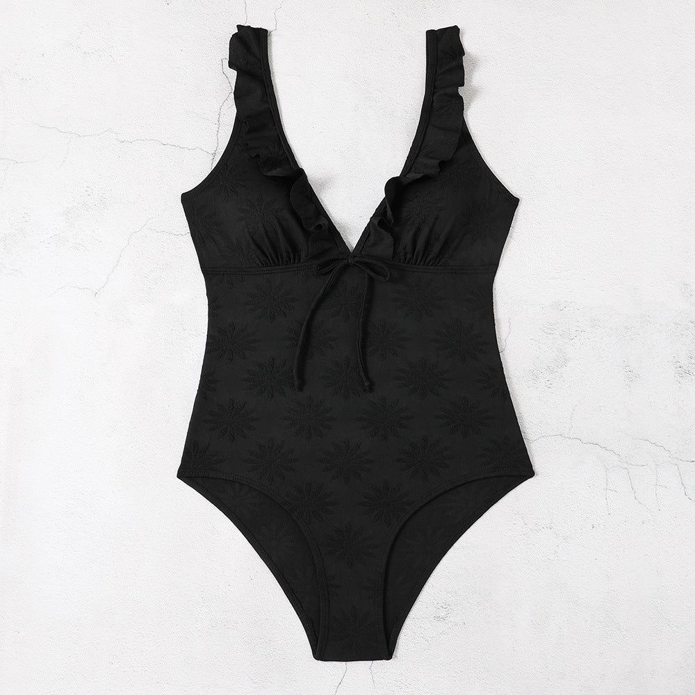 Dame one-piece badedragt med legende ruffle detaljer og dyb v-hals Stilla