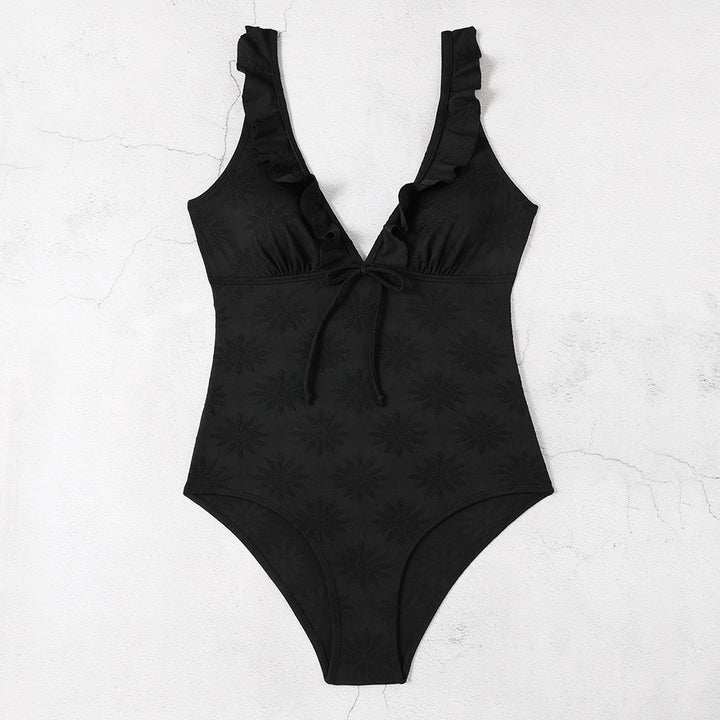 Dame one-piece badedragt med legende ruffle detaljer og dyb v-hals Stilla