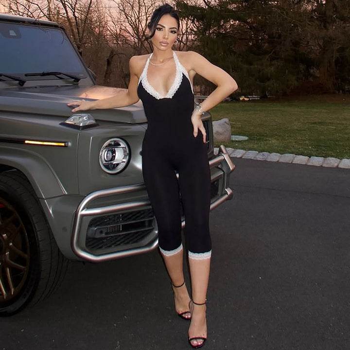 Dame Elegant Jumpsuit med spidsdetaljer og figursyet silhuet Skovae