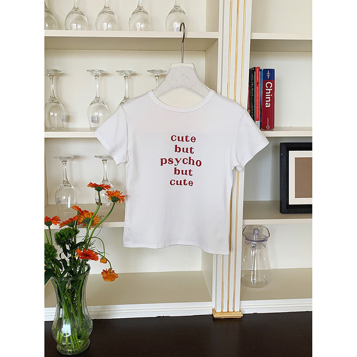 Dame T-shirt med beskrivendetryk og figursyet snit Stilla