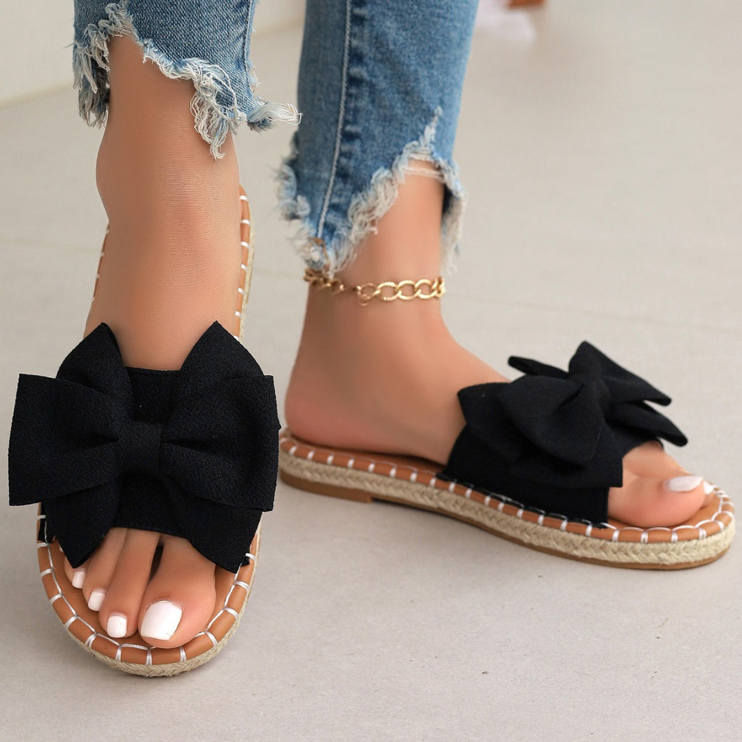 Dame slidesandaler med elegant sløjfe-look og blødt fodbeds Stilla
