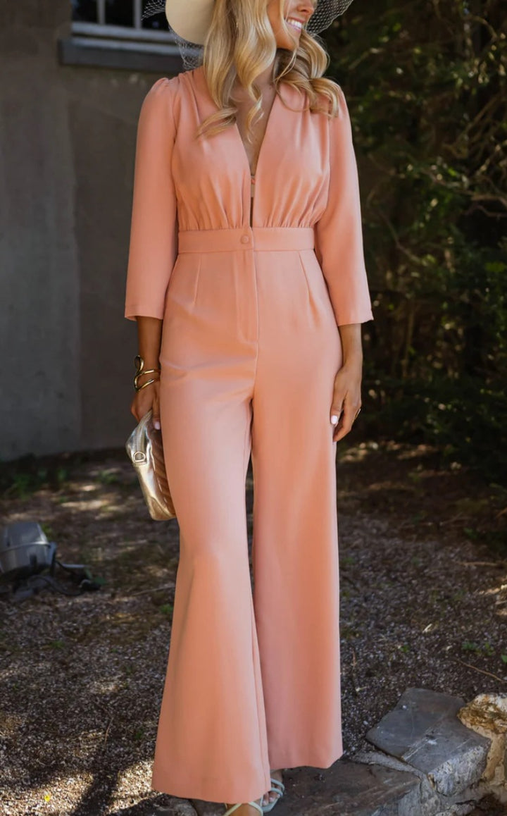 Dame jumpsuit med elegant V-halsudskæring og bredt ben Stilla