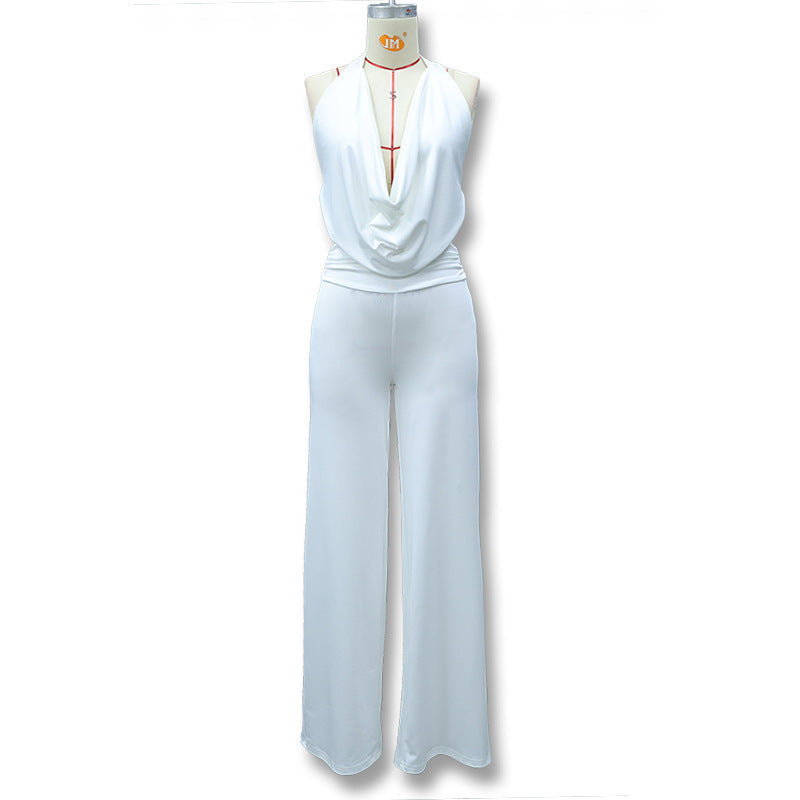 Dame Jumpsuit med elegant indpakningsdetalje og brede benpartier Skovae