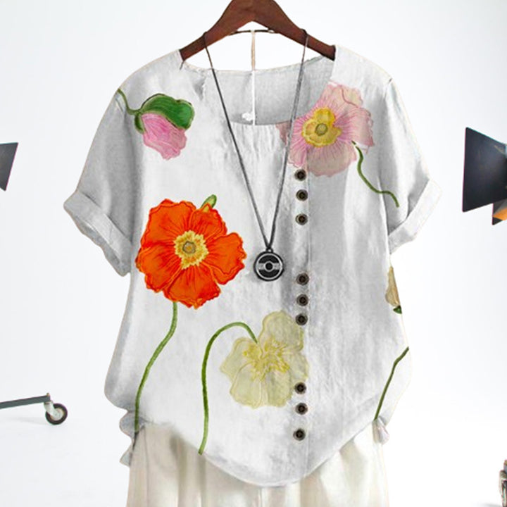 Dame kortærmet bluse med floral motiv og knapdetalje Stilla