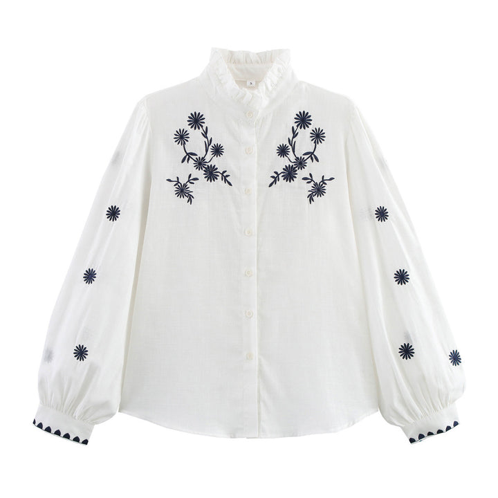 Damebluse med blomsterbroderi og høje pufærmer Stilla