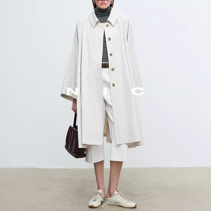 Kvinders afslappede trenchcoat med oversized ærmer og knapdetaljer Stilla