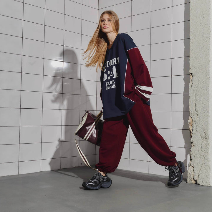 Kvinders oversized tracksuit med grafisk print og brede bukser Stilla