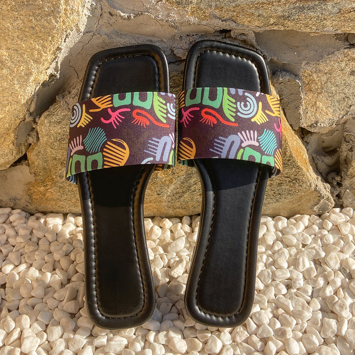 Dame slide-sandaler med trendy kys-motiv og behagelig sål Stilla