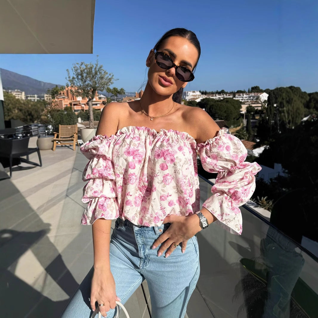 Damebluse med blomstret design og ballonformede ærmer Stilla