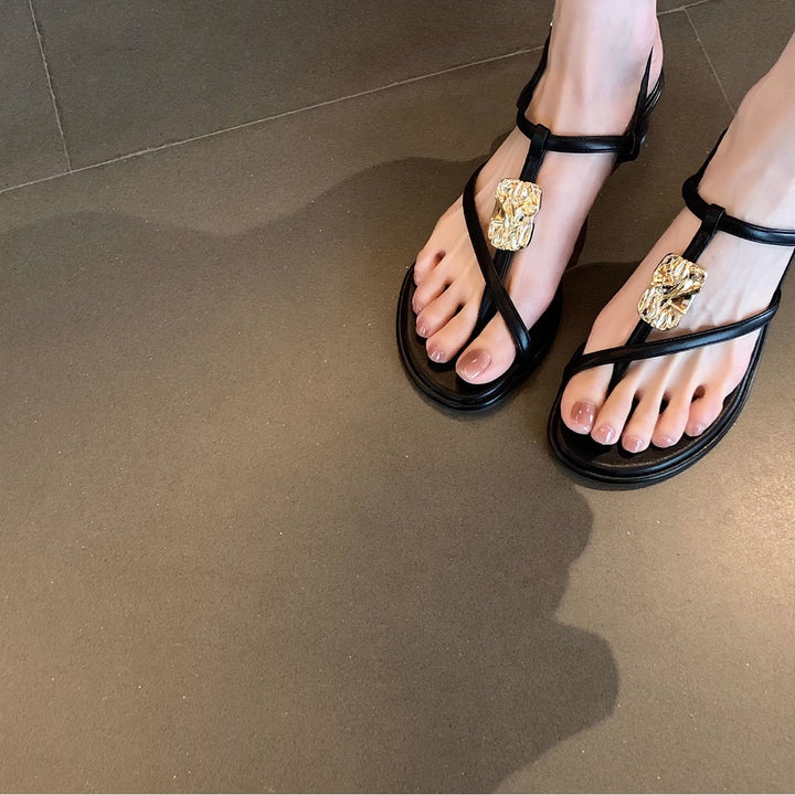 Dame sandaler med elegante gyldne accentuer Stilla