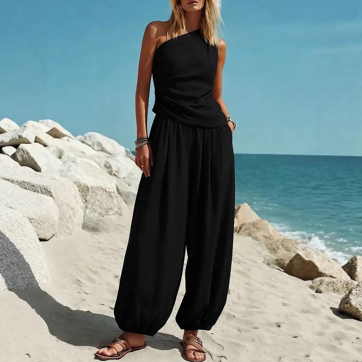 Damer Elegante Én-delt Outfit med Flydende Snit og One-Shoulder Design Skovae