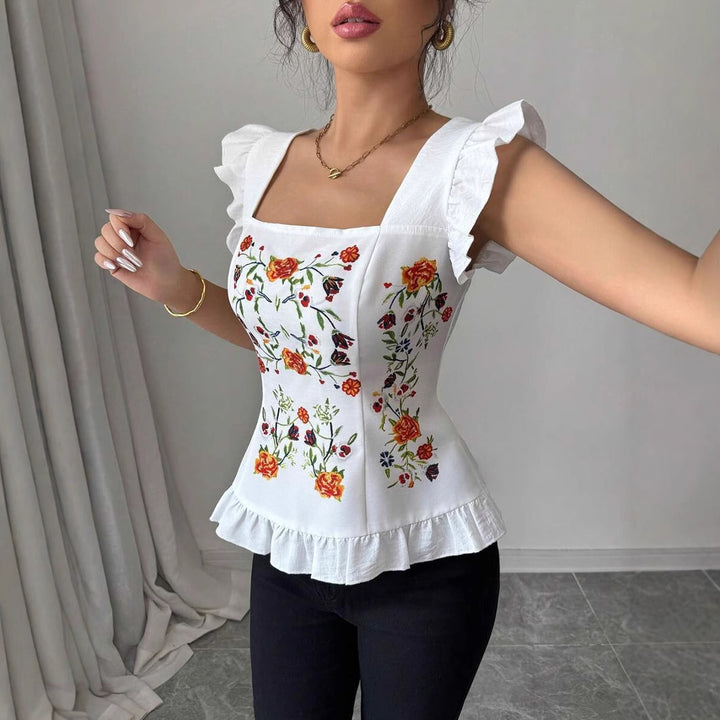 Damebluse med blomster broderier og flæse detaljer Stilla