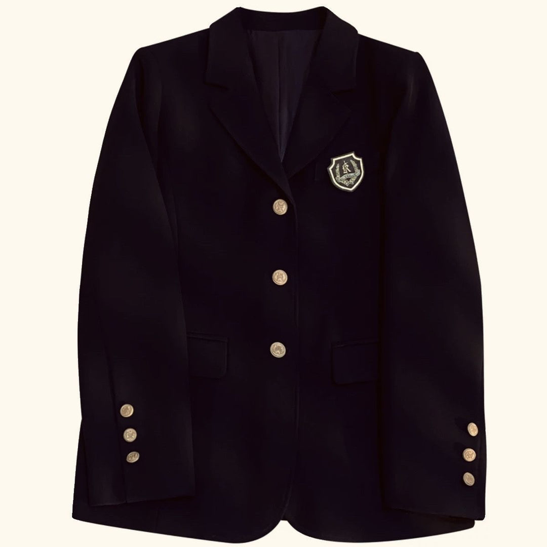 Damernes elegante blazer med gyldne knapper og emblem Stilla