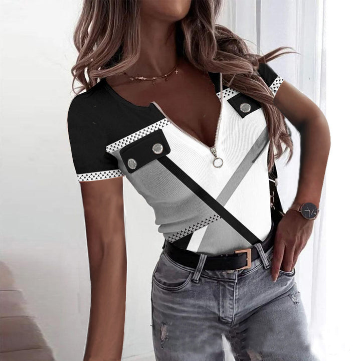 Dame Fashion top med lynlås og kontrastdetaljer Stilla