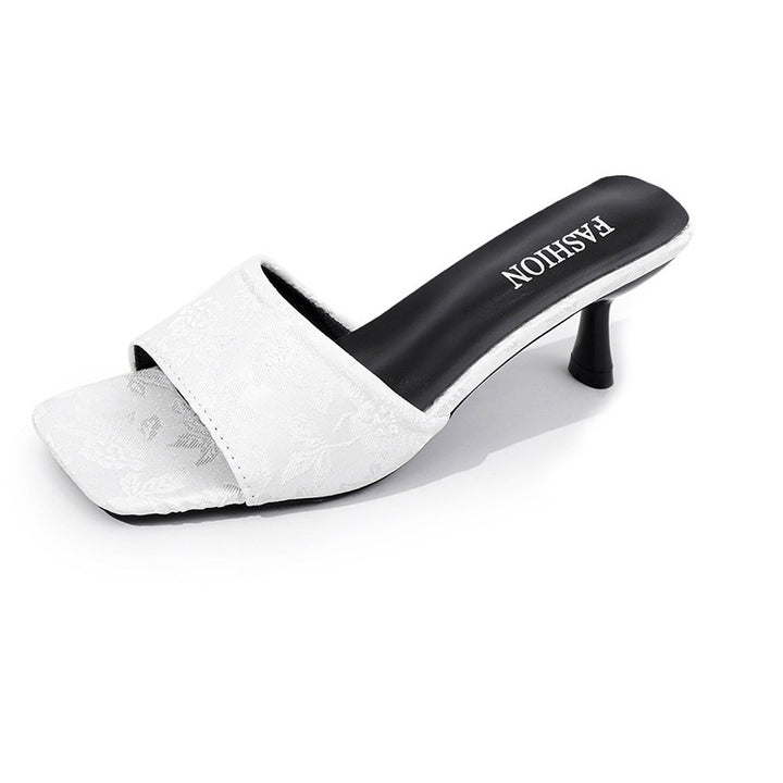 Damer Behagelige Slingback-Pantoletten med elegant blomstermønster og moderne hæl Stilla
