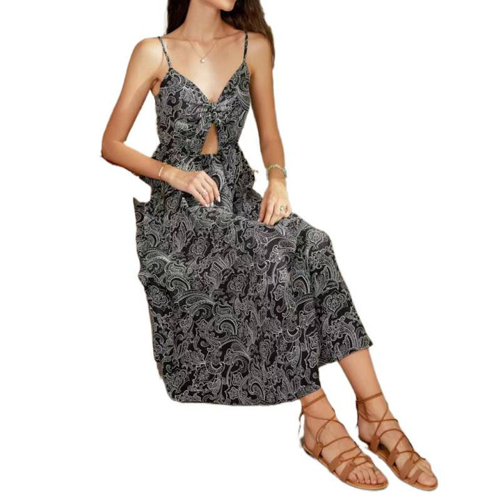 Dame maxikjole med legende cut-out-design og florale motiver Skovae