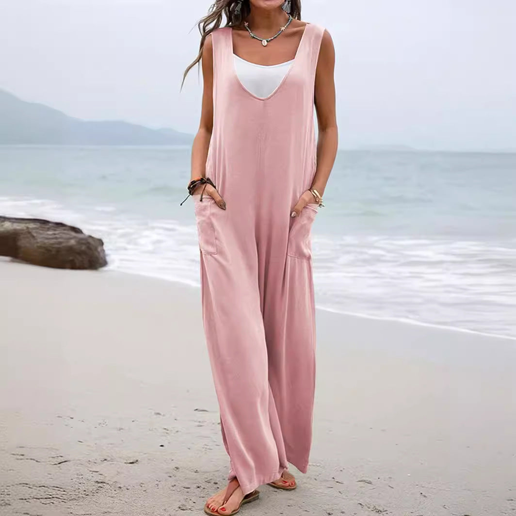 Dame afslappet jumpsuit med dyb V-hals og praktiske lommer Stilla