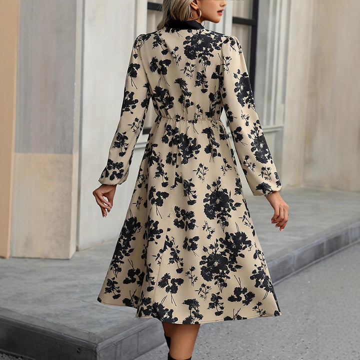 Dame Midikjole med elegant blomsterprint og sløjfebluse Stilla
