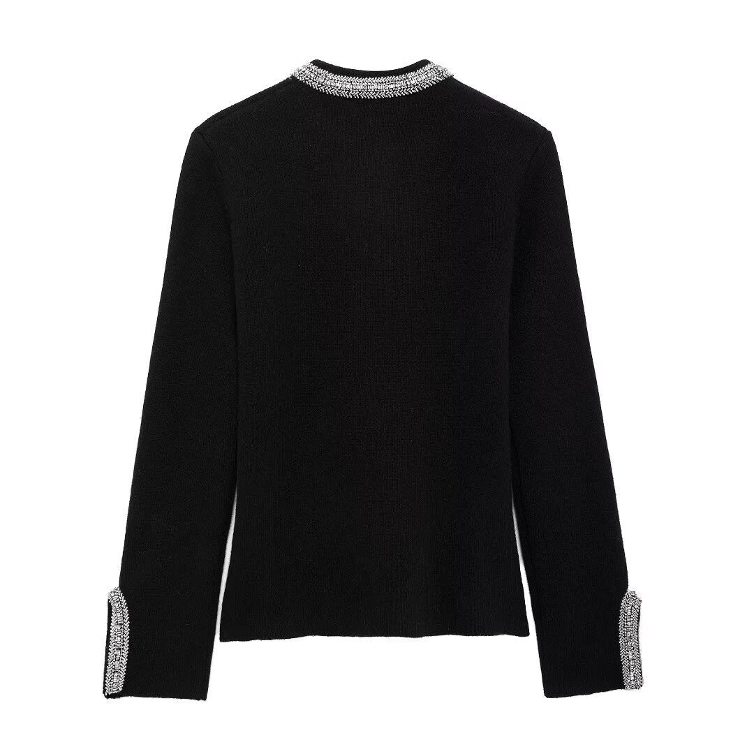 Dame Elegant strikcardigan med dekorativt pynt Stilla