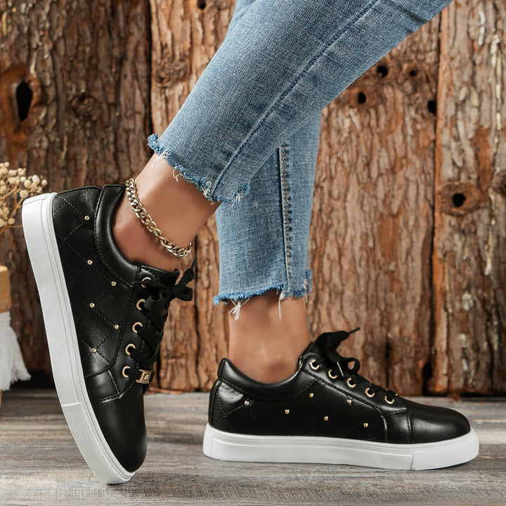 Dame Sportliche Fritids-sneakers med fashionable metalakcenter Stilla