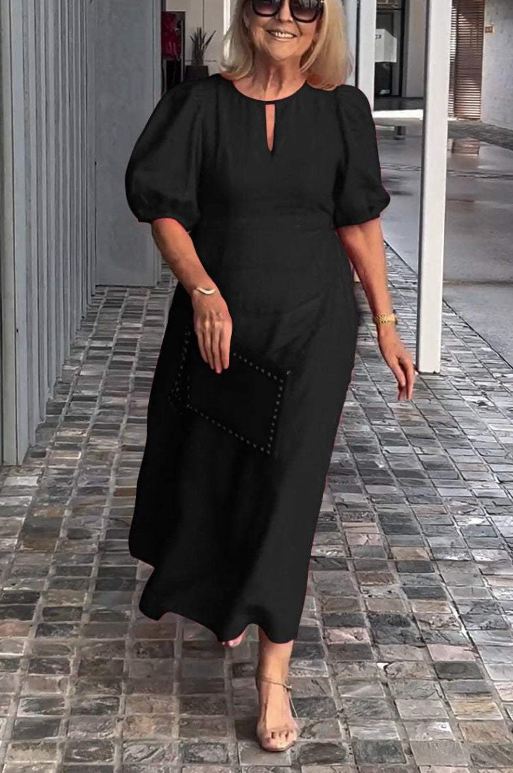 Dame elegant, løs maxikjole med puffærmer og smart udskæring Stiila