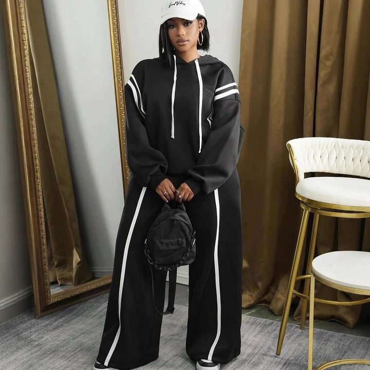 Kvinders sporty loungewear sæt med opfoldede ærmer og sidelister Skovae