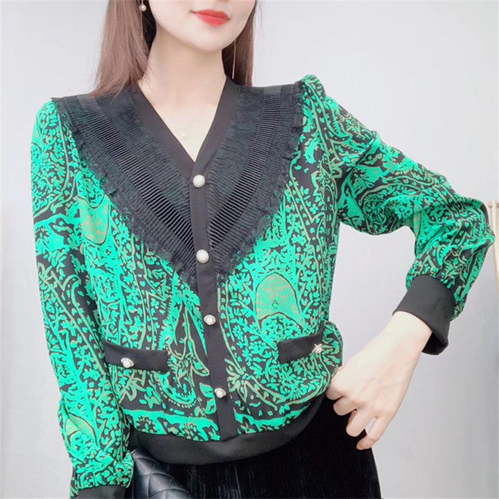 Damebluse med unik spidskrave og elegant tryk Stilla