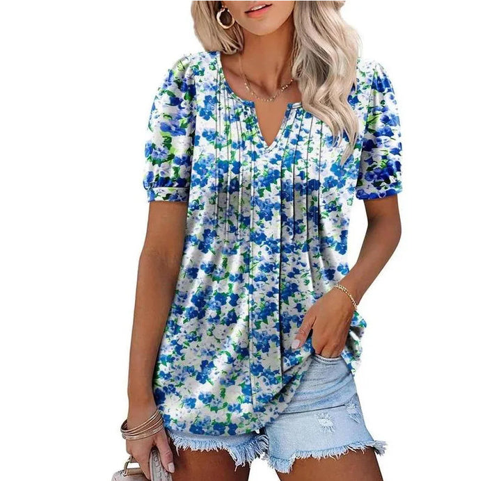 Damebluse med flæseærmer og blomsterdesign Stilla