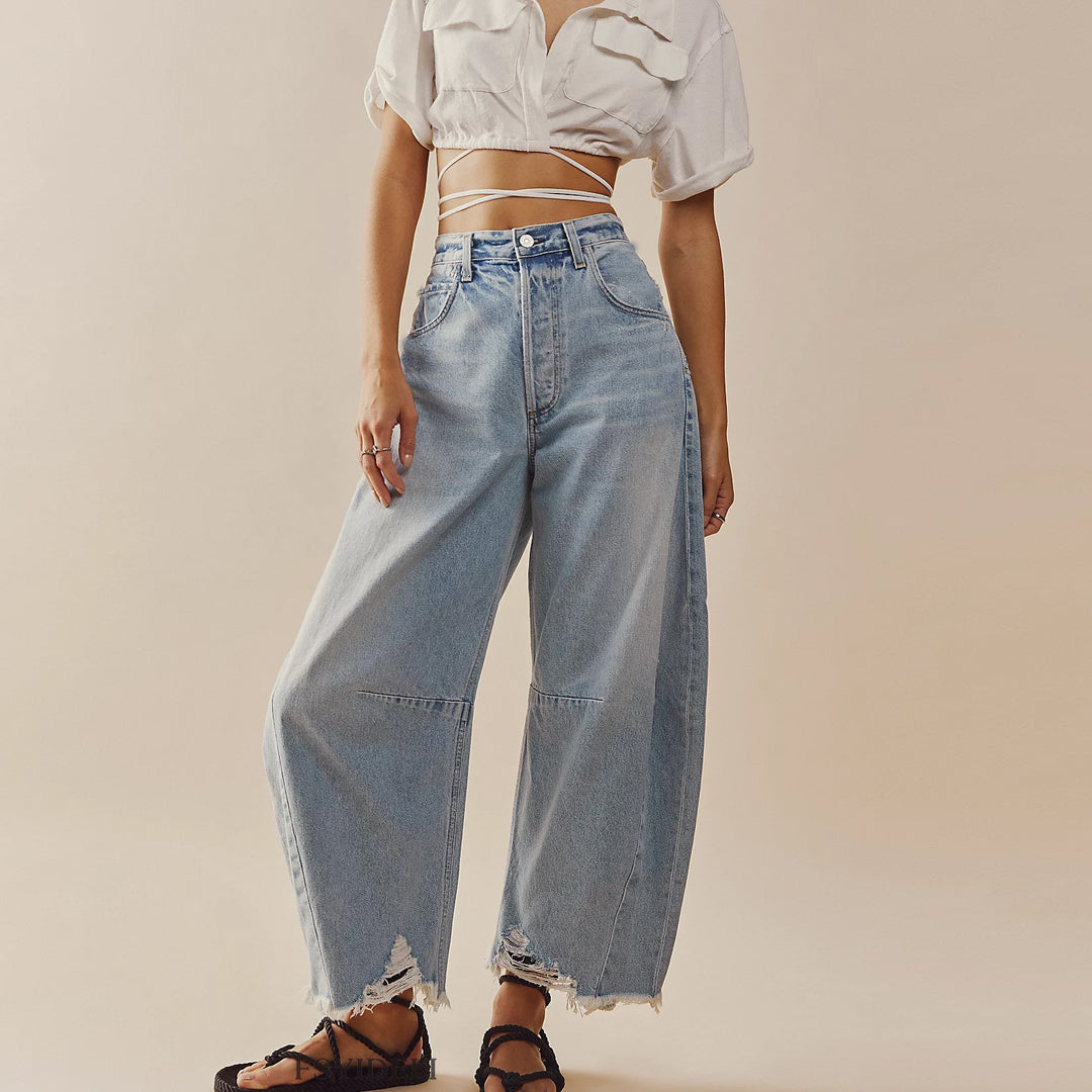 Damevidde jeans med moderigtigt slag og frynset kanter Stilla