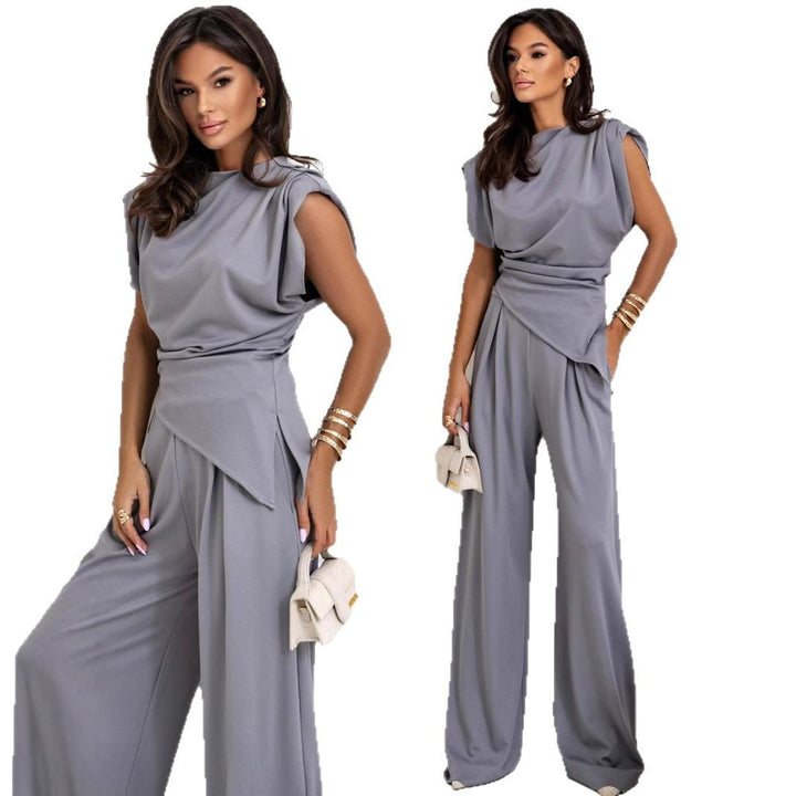 Dame elegant jumpsuit med asymmetrisk snit og draperet overdel Stiila