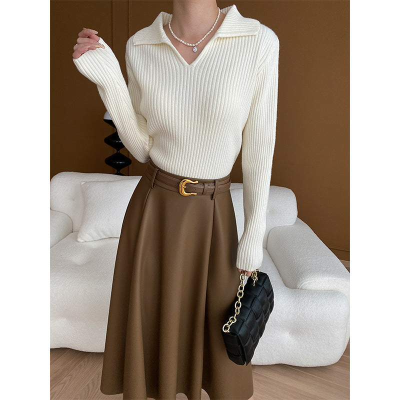 Kvinders strikket sweater med moderne V-hals og ribbet struktur Stilla