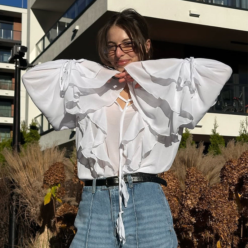 Damer ruffle blouse med gennemsigtige ærmer og sløjfe lukning Stilla