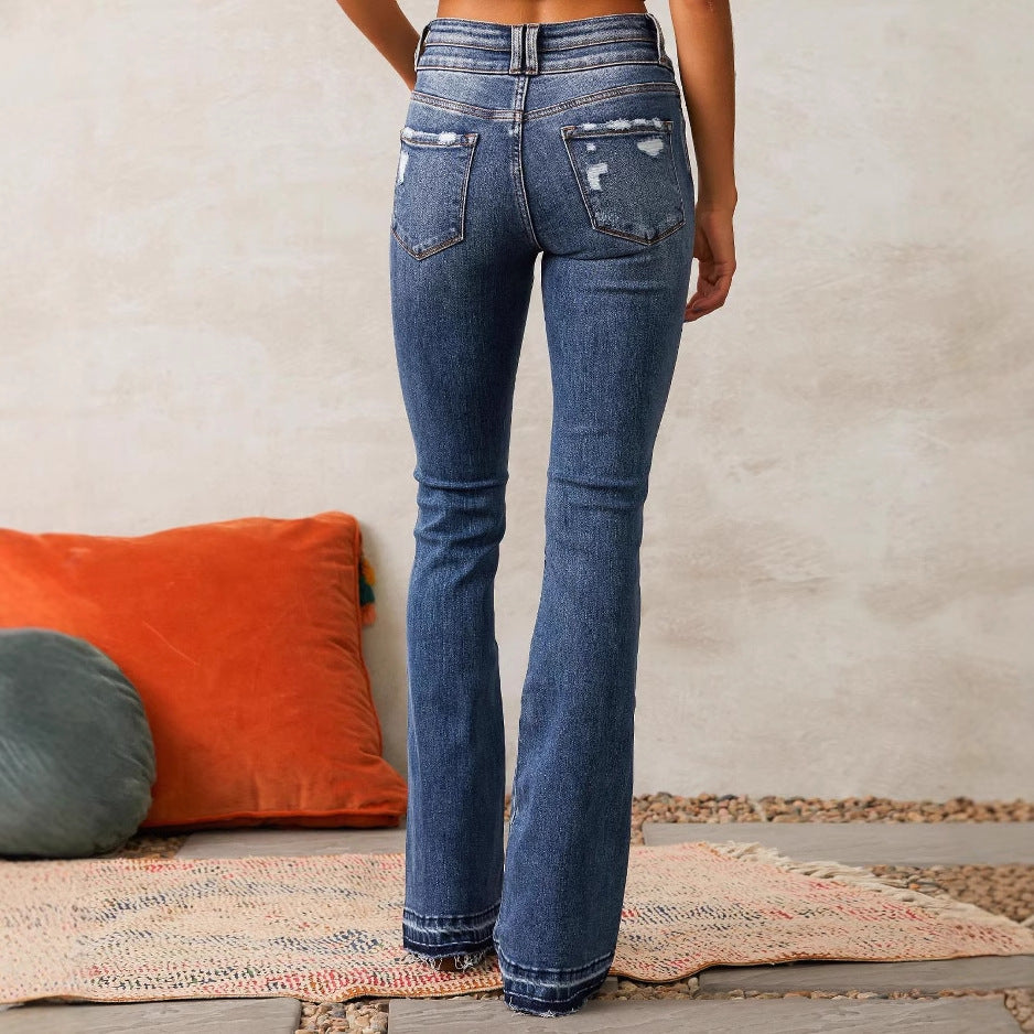 Kvindernes højtaljede flared jeans med fashionable distressed detaljer Stilla