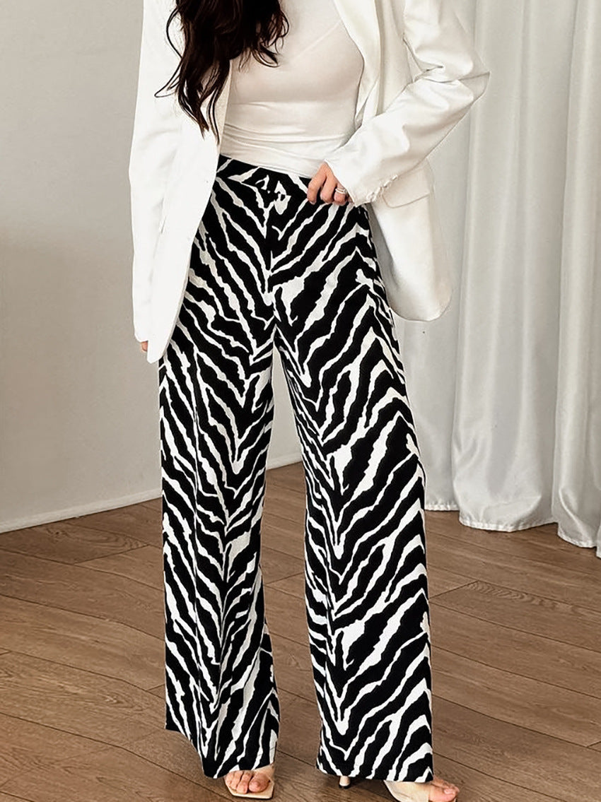 Dame bred Zebra-print Palazzo-bukser med elastisk talje og elegant snit Stilla