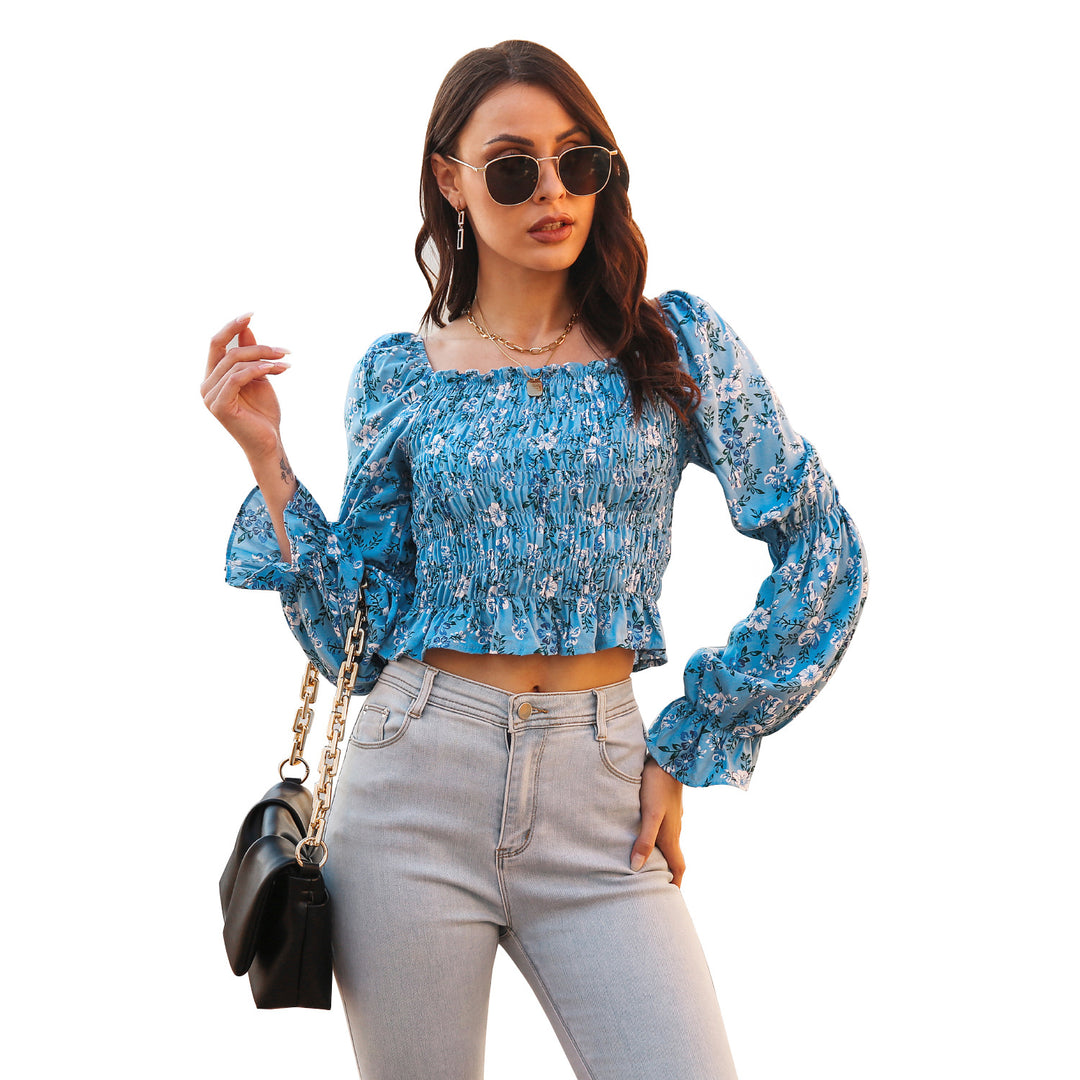 Damebluse med voluminøse ærmer og blomsterprint Stilla