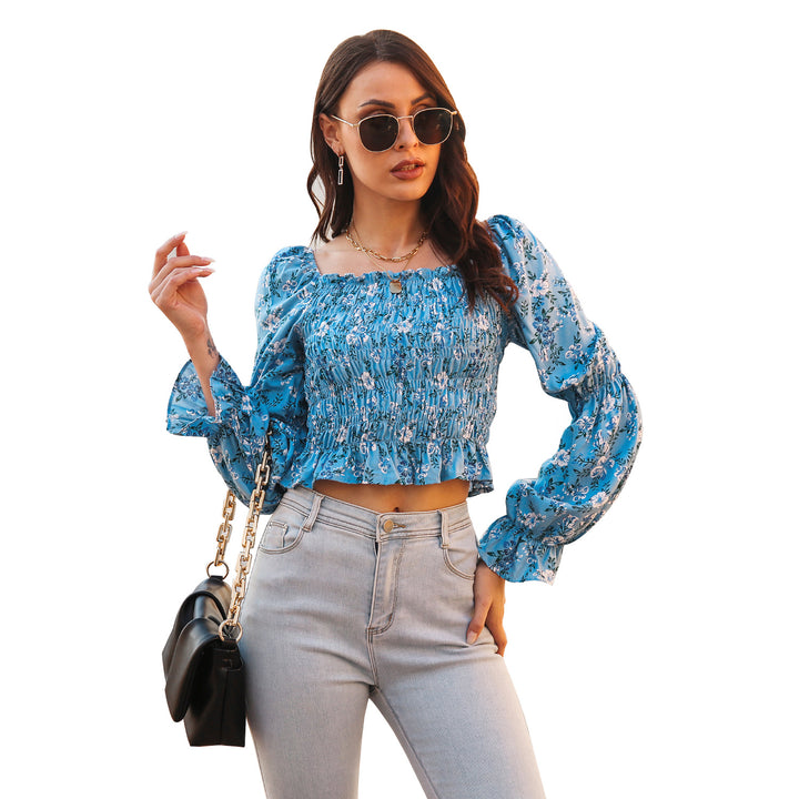 Damebluse med voluminøse ærmer og blomsterprint Stilla