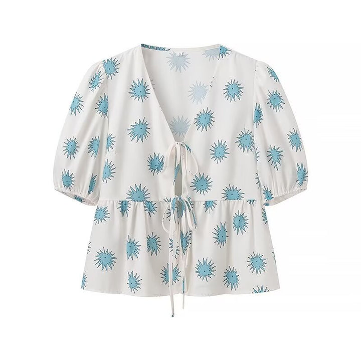 Dame sæt bestående af overdel og løst skåret bukser i floralt design Stilla