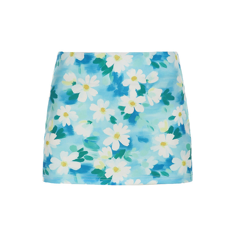 Dame mini nederdel med blomsterdesign og elastisk talje Skovae